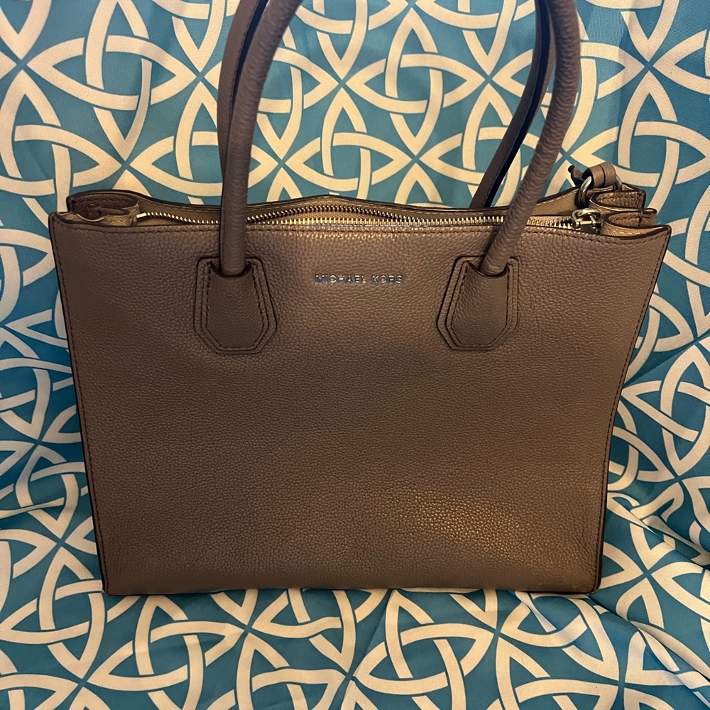 Michael Kors grey used hand bag.